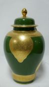 A very large green and 18ct gold painted, porcelain lidded jar and cover, 58 x 32cm.