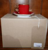 4 boxed Legle Limoges, red/18ct finish porcelain coffee cups and 4 saucers.