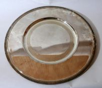 A Christofle, silver-plated circular tray with engraved rim detail, Dia: 34cm. Engraved 'Christofle'