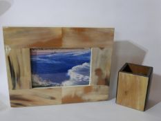 A designer horn-inlaid photoframe and pen pot by Acahorn. Photoframe: 22.5 x 29 x 5cm, Pen pot: 11 x