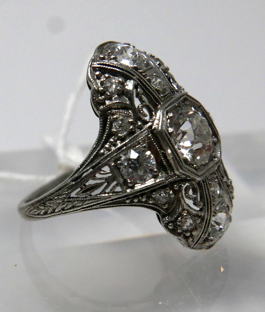 An 18ct white gold, Art Deco ring set with a large brilliant-cut diamond radiating to a further 8 - Image 5 of 7