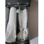 A boxed set of 6 Mario Cioni, Italian, champagne flutes with 3 bubble stem, H: 21cm, Engraved to