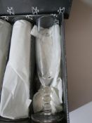 A boxed set of 6 Mario Cioni, Italian, champagne flutes with 3 bubble stem, H: 21cm, Engraved to