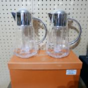 A boxed, pair of Zanetto, 'Angie' silver-plated and glass pitchers, H: 28cm.