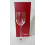 8 Baccarat, plain wine glasses (Individually Boxed) H: 21.5cm, Engraved 'Baccarat' to each foot.