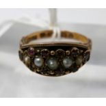 A 15ct yellow gold, Georgian, graduated pearl and ruby ring with hand-carved shoulders, Size: N 1/2,