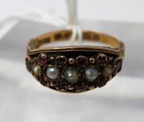 A 15ct yellow gold, Georgian, graduated pearl and ruby ring with hand-carved shoulders, Size: N 1/2,