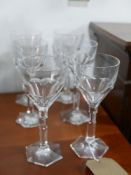 A set of 6 large, Baccarat, French crystal faceted wine glasses to hexagonal bases, H: 19cm.