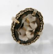 A 9ct yellow gold, antique citrine ring, centrally set with a faceted, oval citrine in a