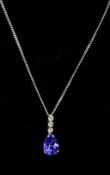 A boxed, 18ct white gold, diamond and tanzanite pendant on 9ct white gold chain, pendant: 1.8 x 1.