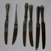 Three blocks of individual knives (ex display)- handles silver and gold plated.