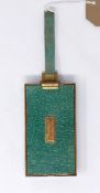 A 1940's/50's weighty brass and green enamelled (shagreen effect) compact, monogrammed to front of