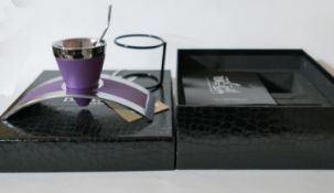 A boxed, DE VIEHL purple leather and chrome single expresso cup, H: 9cm, RRP: £410