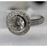 An 18ct white gold, diamond solitaire ring (1.41 carats total) with EDR certificate diamond