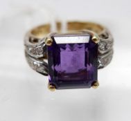 A 14ct yellow gold, diamond and amethyst ring, centrally set with a large, stepped cut,