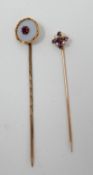 Two, Victorian, yellow gold stick pins: circular white agate and ruby example L: 6.5cm and