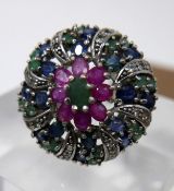 A sterling silver, emerald, ruby and sapphire cluster ring in the Mughal style, Size: G, 12.7g.