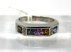 An 18ct white gold, multi sapphire and diamond ring, channel set with 5 square, princess cut