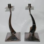 A pair of Platta Lapas, silver plated and horn candlesticks, on squared bases, H: 31cm.