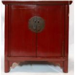 A Chinese red lacquered cabinet by Lombok, H.85 W.77 D.50cm