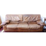 A 1970's Roche Bobois brown leather three seat sofa