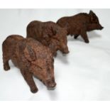 Three sculptures of boar, H.32 W.49 D.15cm (3)