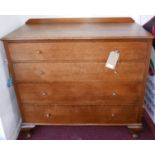 An oak chest of four long drawers, raised on cabriole legs and pad feet, H.102 W.98 D.45cm