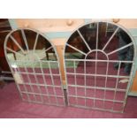 A pair of arched garden mirrors, 78 x 49cm (2)