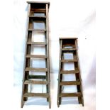 Two vintage step ladders