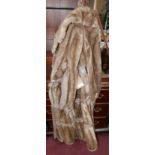 A ladies faux fur and leather coat