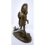 A 19th century Indian bronze sculpture of Kali Maa god of death, H.13cm