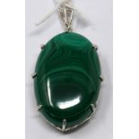 A sterling silver and polished malachite cabochon pendant to a sterling silver pendant loop, 5 x 2.
