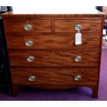 A Georgian mahogany chest of two short over three long drawers, raised on outswept feet, H.105 W.103