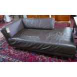 A modern brown leather chaise raised on tubular chrome supports, by Habitat, L.170 D.85cm
