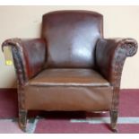 An Edwardian burgundy leatherette armchair. H.85 W.83 D.80cm