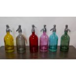 A set of six multi-coloured glass soda syphons, H.33cm (6)