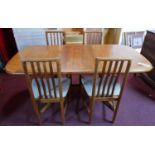 A Benny Linden teak dining table and four chairs