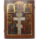 A Russian icon with panels of the Mother of God above a central white metal crucifix, 44cm x 35cm