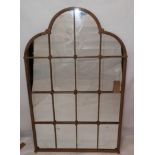 A large arched garden mirror, 147 x 92cm
