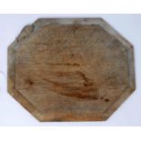 A Robert Thompson 'Mouseman' oak chopping board, 31 x 25cm