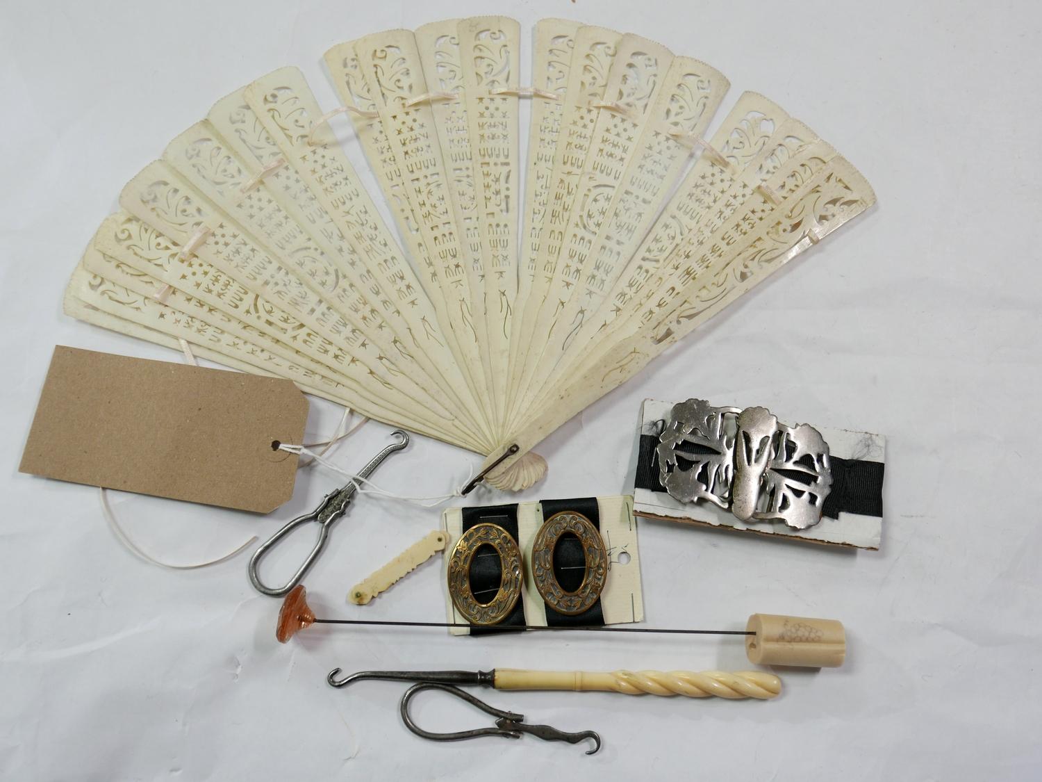 A collection of antique items to include a pierced bone fan L: 23.5cm, a hatpin, two pairs of