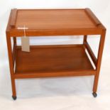 A 20th century Danish teak two tier trolley by BL Mobler, with removable tray, H.66 W.70 D.47cm