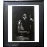 Francine Winham (1937-2013), a print of a photograph of Nina Simone, signed in pencil, 60 x 50cm