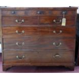 A Georgian mahogany chest with five short over three long drawers, raised on bracket feet, H.106 W.