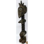 An early 20th century West African tribal carved and ebonised fertility figure, H.54cm