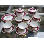 A part porcelain tea service marked M.K, handle on tea pot broken