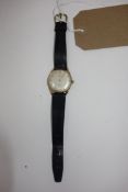 A Services 1950's gentleman's wristwatch, the dial with baton markers, 17 jewel movement, associated