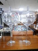 A pair of large glass bon bon jars and covers, H.73cm (2)