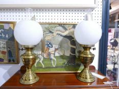 A pair of brass oil lamps, with opaque glass shades, on stepped circular bases, H.52cm (2)