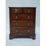 A Victorian mahogany apprentice piece, miniature chest of drawers, H.38 W.32 D.20cm